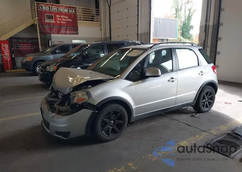 2010 Suzuki Sx4 Technology z USA, uszkodzony, nr VIN JS2YB5A39A6302670